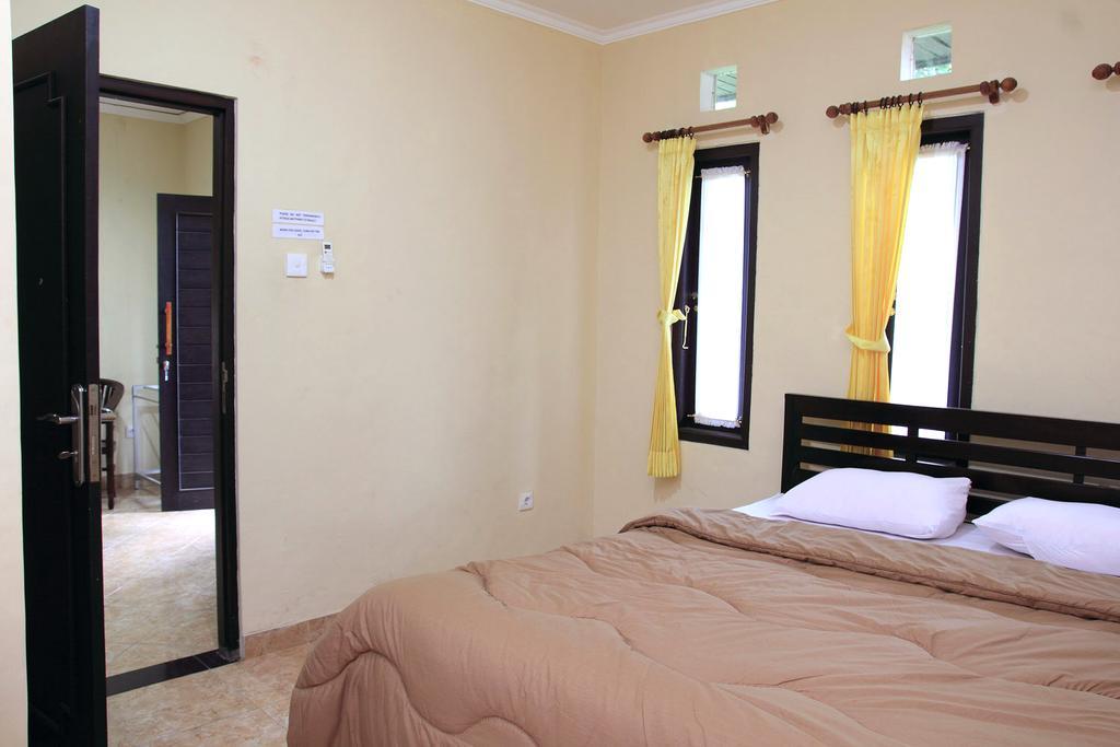 Cinthya Guest House Legian Habitación foto
